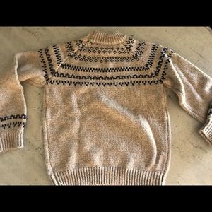 Woman’s knitted stylish sweater